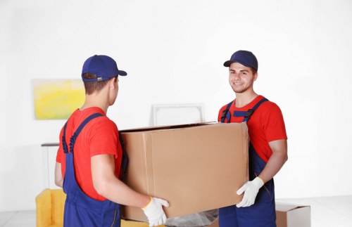 Staff using PPE during a Barbican removal job