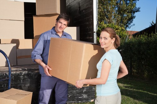 Careful loading of a sofa and bedroom furniture during a collection